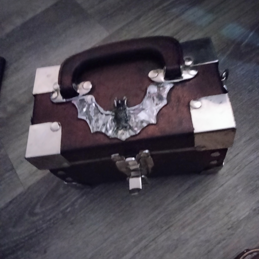 Black and Silver Box with Bat Design